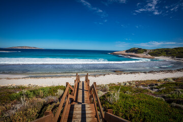 Landscape view of Blue Haven Beach near Esperance in Western Australia under a bright clear blue sky.