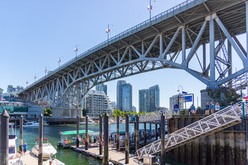 Vancouver, BC / Canada 06/15/2015 Granville Island Bridge perspective view on a summers day