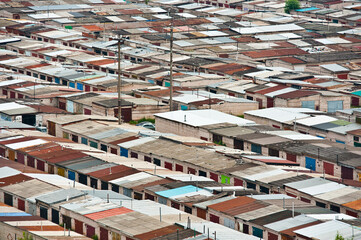The urban outskirts of a poor settlement. Garages.