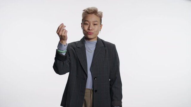 Portrait of a confident Asian person who wants to get paid