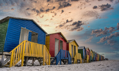 Sunset over iconic change rooms at Muizenberg, Cape Town, South Africa