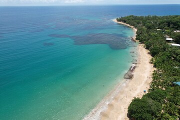 Fototapeta na wymiar Lush tropical Caribbean Coast of Limon in Costa Rica -aerial views of Cocles, Punta Uva, Playa Chiquita and Puerto Viejo 