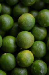 Green lime pile on the market.