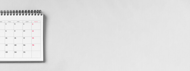 Calendar and copy space on gray background. グレー背景上のカレンダーとコピースペース