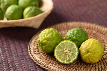 Fresh bergamot fruit on woven rattan plate, Food ingredients and extract used for medicine, tea, perfumes and cosmetics