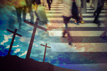 Holding a wooden cross with people walking, religion concept.