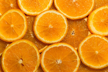Orange slices background. Healthy food, summer time. Fresh fruit.