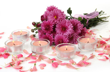 Flowers and burning candles