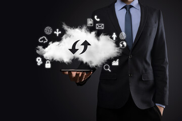 Cloud technology. cloud storage sign with two arrows up and down on dark . Cloud computing, big data center, future infrastructure, digital ai concept. Virtual hosting symbol