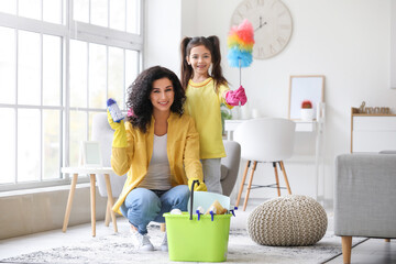 Mother and daughter cleaning their flat