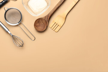 Set of kitchen utensils on color background