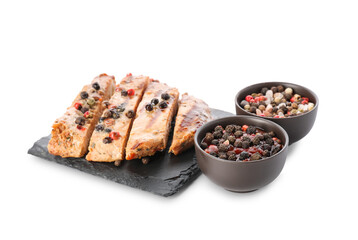 Tasty steak with peppercorn sauce on white background