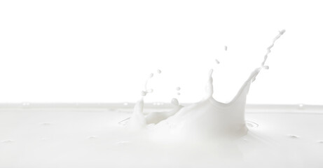 Splashes of tasty milk on white background