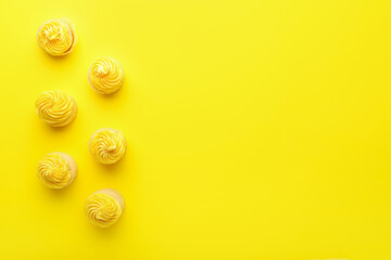 Tasty cupcakes on color background