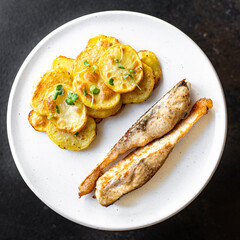 baked fish and potato fried slice garnish seafood omega diet meal snack copy space food background rustic top view