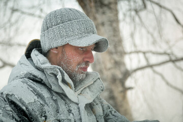 Portrait of a worker in a black cap