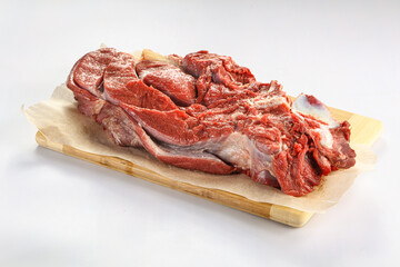 Raw beef meat over board