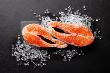 Fresh raw salmon cooking. Fish steaks on ice