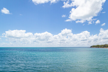Fototapeta na wymiar blue sky, sea and clouds