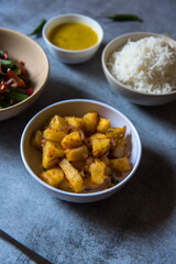 Cooked food potato masala background. Close up, selective focus.