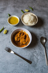 Rohu fish masala or curry, an Indian delicacy. Generally served with steamed rice and yellow pulses. Top view.