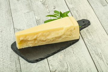 Hard parmesan cheese served basil