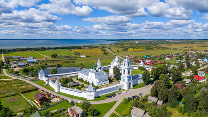 Panoramic aerial view of Nikitsky monastery and lake Pleshcheyevo on sunny summer day. Pereslavl-Zalessky, Yaroslavl Oblast, Russia.