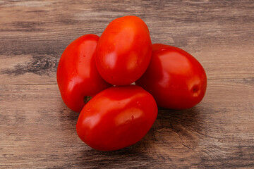 Red bright tasty tomato heap