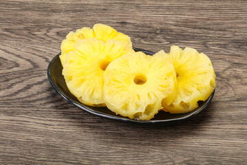Sweet pineapple rings in the bowl