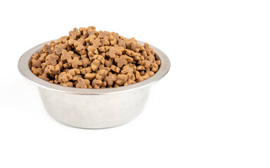 Bowl full of dry pet food isolated on white background