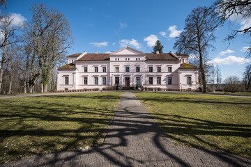 Fototapeta na wymiar Ivande manor in sunny spring day, Latvia.