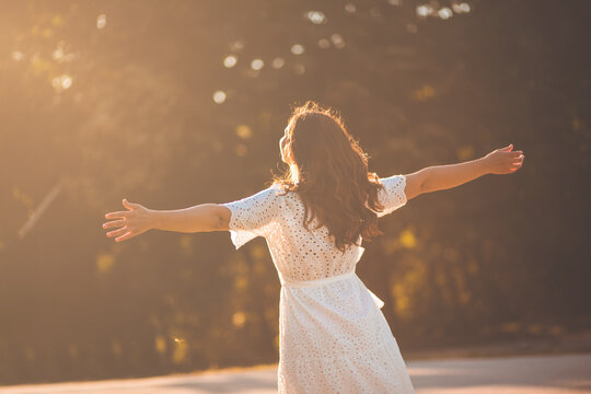 To Be Happy You Must Be Your Own Sunshine. Woman In The Park.