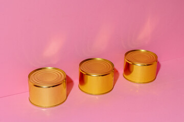 Canned food tin on pink studio background