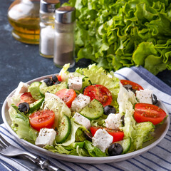 Greek salad on a plate. Closeup