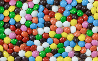 Fototapeta na wymiar Round milk chocolate colored balls