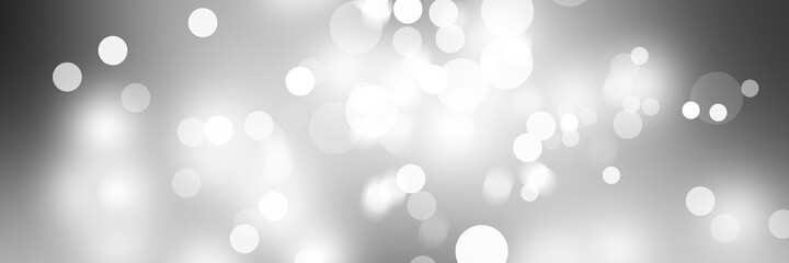 White circle light on gray smooth backdrop or silver snowflake background. 