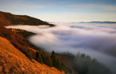Fototapeta na wymiar Mountains Landscape with Inversion in the Valley at Sunset, Slovakia