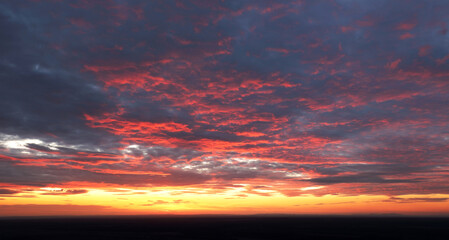 Fototapeta premium Only sky at sunset, abstract view with red and orange clouds