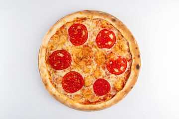 Isolated margherita pizza with tomato on a wooden board