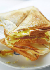 Toast on a white plate on a white background