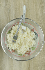 Sticky rice on bowl on table wood.