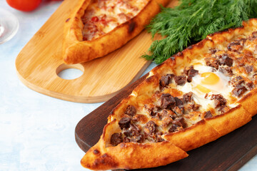 Close up of Turkish Pide bread on wooden table