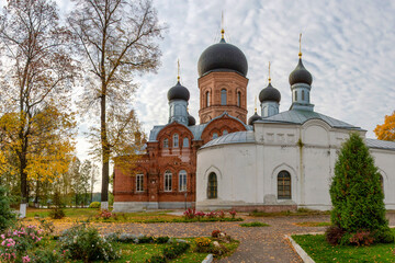 Fototapeta na wymiar Vvedensky Ostrovnoy Monastery on sunny autumn day. Pokrov town, Vladimir Oblast, Russia.