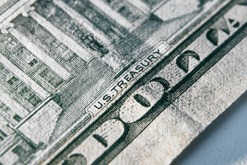 United States treasury sign on the US dollar bill. Macro photo of sign on the dollar banknote.