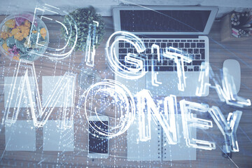 Blockchain theme hologram drawings over computer on the desktop background. Top view. Double exposure.