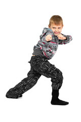 Boy grimaces and indulges on a white background. Isolated.