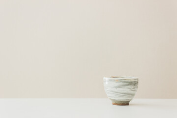 A ceramic blow on table.