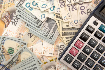 polish money and calculator as business and exchange concept