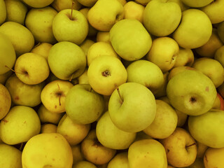 Background from apples on the windscreen in the store. Apples pattern