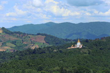 Fototapeta na wymiar white pagoda on the hill